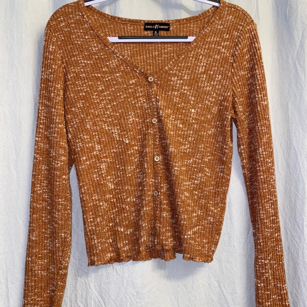 Rusty orange long sleeve shirt with wooden buttons